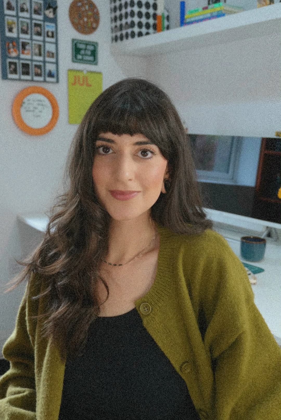 Nicoly W., UGC content creator, smiling at the camera